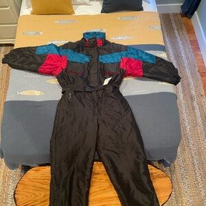 MCM Black Ski Jumpsuit with Red and Blue Accents